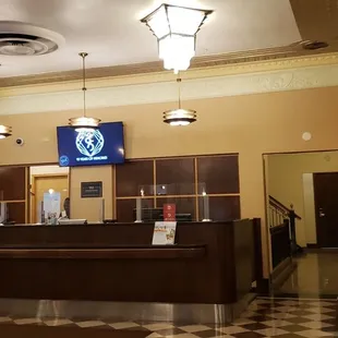 the front desk of a hotel
