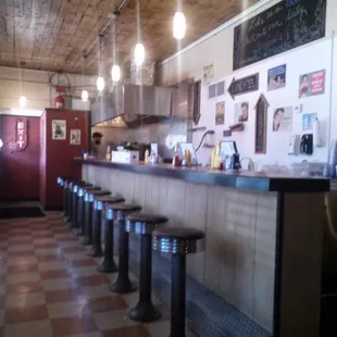 Once a donut shop, now a kitchen/bar.