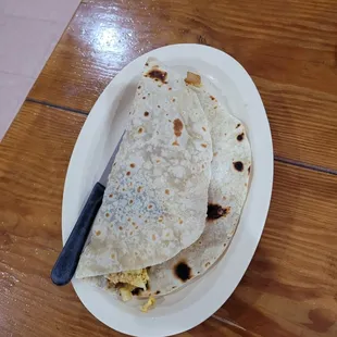 Egg and potato taco. Big! FLOUR TORTILLA