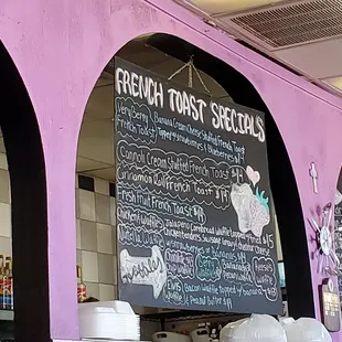 Several Chalkboards throughout this Restaurant with Menu Items listed.  9/5/2024