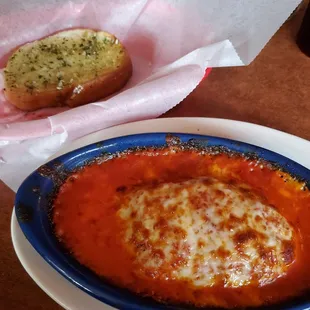Lunch lasagna with garlic bread