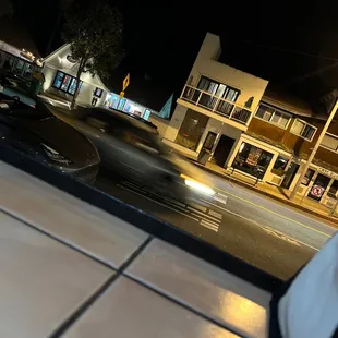 a blurry view of a street at night