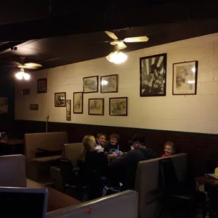 a group of people sitting at a table