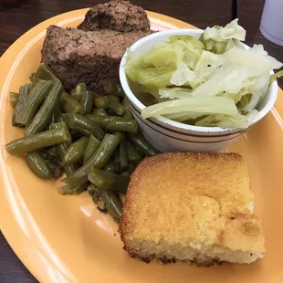 Meatloaf with cooked cabbage and green beans