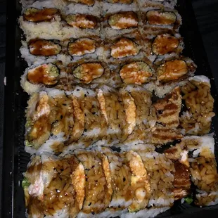 a large tray of sushi