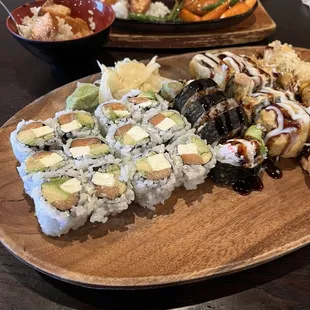 Delicious- Salmon Teriyaki dinner, Philly, Ginban and calamari rolls