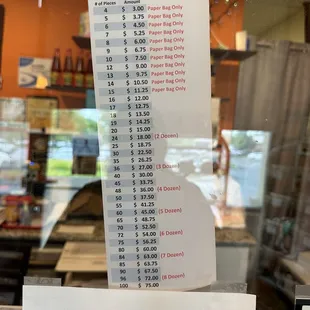 Spanish Rolls pricing. There's a bunch of random signs like the one at the bottom of this.