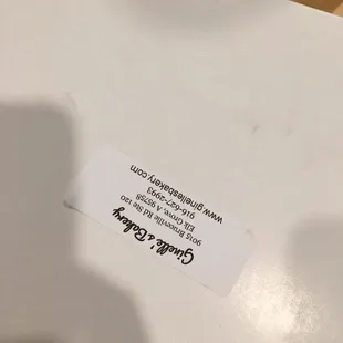 a business card on a table