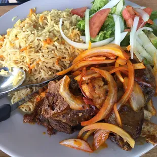Goat and Rice - Somalians make the best rice ever. I love the flavor.