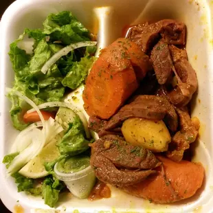 Osso Buco: sort of a beef stew tasting dish. About $11, and it came with a big thing of rice. Nothing special, but tasty &amp; good value.