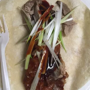 I wrapped this from the Half Peking Duck order - flavor explosion, without the empty wallet and sad feelings you would get at Peking Gourmet