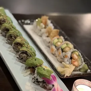 a sushi roll and an avocado roll
