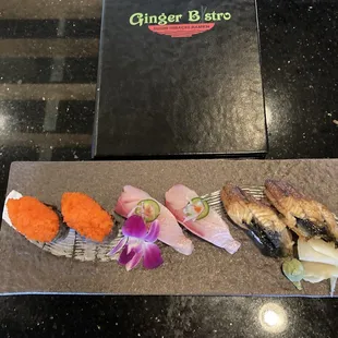 This is a beautiful presentation of massago on the far left yellowtail in the middle and freshwater Hill on the far right