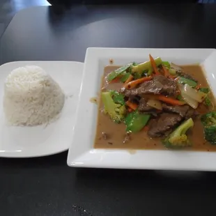 Thai peanut sauce stir fry with beef and rice.