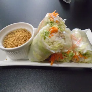 Spring rolls with dipping sauce.