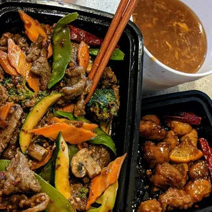 Hunan beef, orange chicken (half devoured)&amp; the necessity: LARGE hot &amp; sour soup  not pictured: pork fried rice, because we ate it.