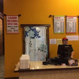 a man behind a counter