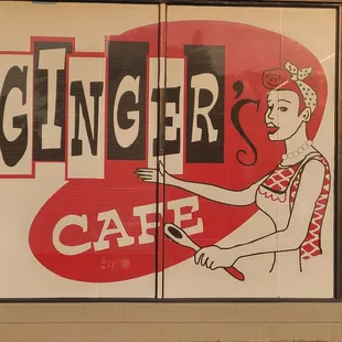 a woman holding a spatula