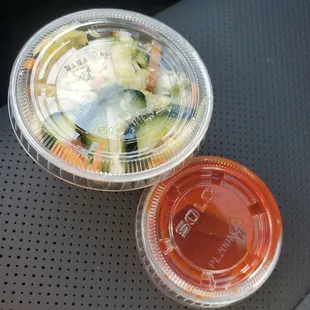 Mild kimchi slaw and side of gochujang sauce