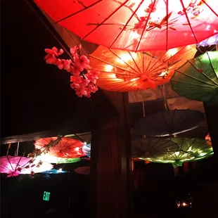 colorful umbrellas hanging from the ceiling