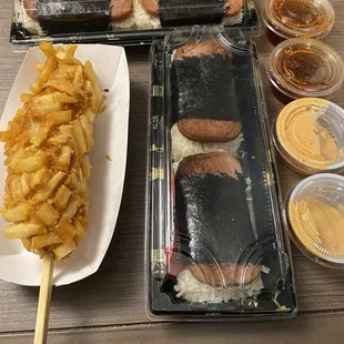 Korean Potato Rice Flour Sausage Dog, Spam Musubi, spicy mayo and spicy BBQ style sauce