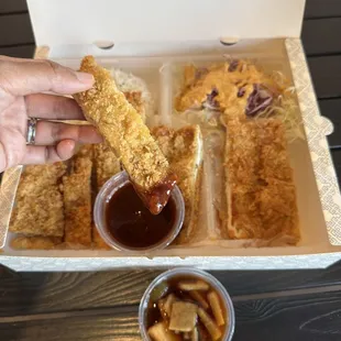 Katsu box: Rice, hand-breaded katsu (pork, chicken, fish), cabbage salad with housemade dressing, katsu dipping sauce, pickled veggies