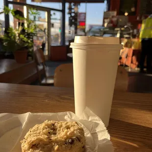 a muffin and a cup of coffee