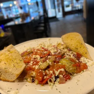 a plate of pasta and bread