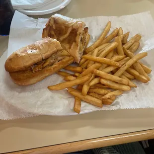 Half a hoagie with fries