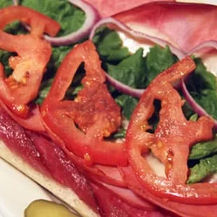 a tomato and lettuce sandwich