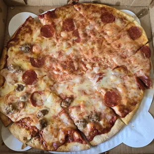 16" half sausage, half pepperoni pizza. Looked very messy.