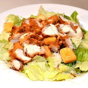 Caesar Salad w/ Fried Chicken pieces.