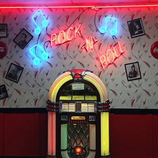 a juke box with neon lights
