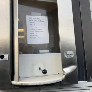 Pick up window with condiment prices