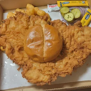 a fried chicken sandwich in a box