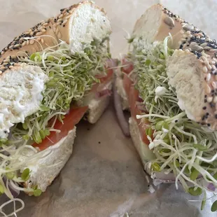 Morning Special: cream cheese, sprouts, tomato, cucumber &amp; red onion on a toasted everything bagel