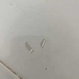 Sharp slivers of plastic after cleaning them off from finding in my avo toast.