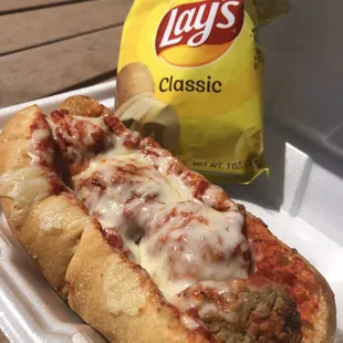 Meatball Parmigiana Homemade Hero with chips
