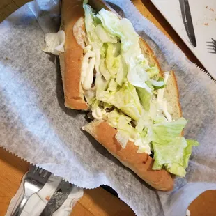 a sandwich with lettuce