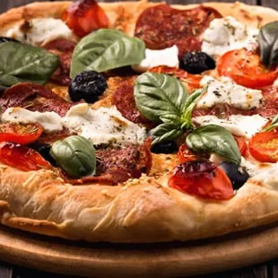 a pizza on a wooden board