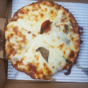Apparently when you order a pepperoni and mushroom pizza you only get one of each ingredient...