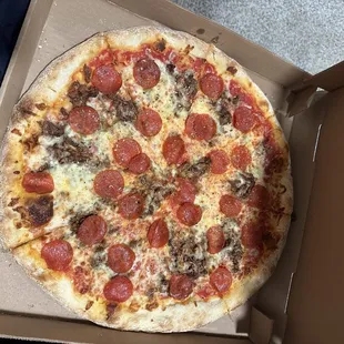 Pizza with pepperoni and Philly steak