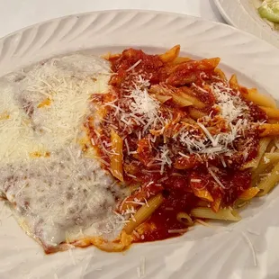 a plate of pasta and cheese
