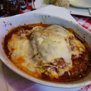 Lasagna, very cheesy, hot and saucy