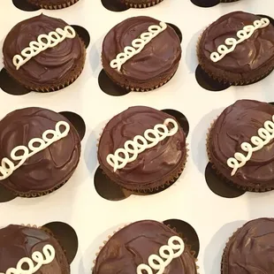 Gluten free homemade "Hostess" chocolate cupcakes filled with fresh cream and covered with ganache and vanilla buttercream swirl.