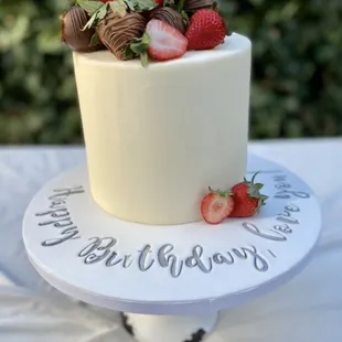 a cake with strawberries on top