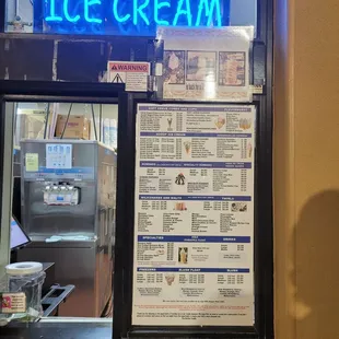 The menu at one of the ordering windows. Common ice cream parlor selection.