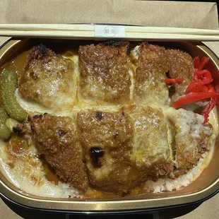 Baked Curry Katsu Don カレーカツ丼のオーブン焼き $16.95. Not your typical takeout container