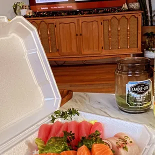 a meal in a styrofoam container