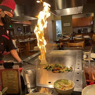 a chef preparing a dish